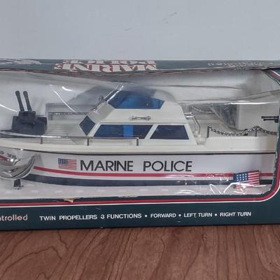 LOT 171B: NIP Radio Controlled Model Boats: Nikko America Inc Challenger V & Marine Police
