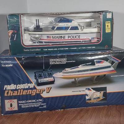 LOT 171B: NIP Radio Controlled Model Boats: Nikko America Inc Challenger V & Marine Police