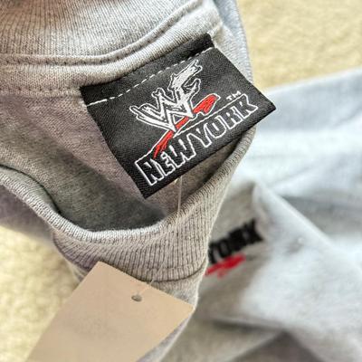 LOT 194B: WWF New York Clothing Collection: Medium T-Shirt, 1999 NWT Long Sleeve w/ Embroidered Logo (Medium) & 1999 Zip Sweatshirt