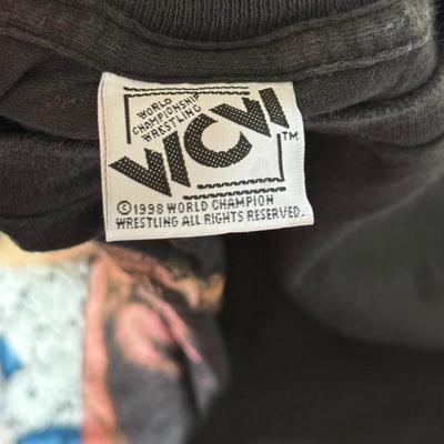 LOT 197B: Wrestling Collection: Hulk Hogan Kids' Bandana, 1998 WWF Celebrity Deathmatch T-Shirt, WWF Attitude Al Snow T-Shirt &...