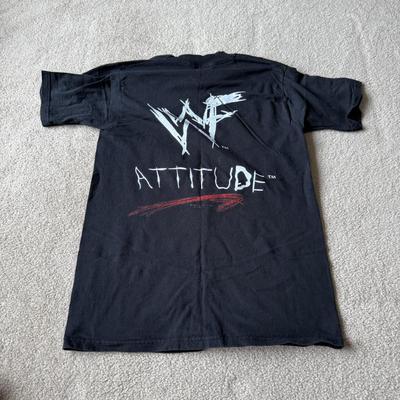 LOT 197B: Wrestling Collection: Hulk Hogan Kids' Bandana, 1998 WWF Celebrity Deathmatch T-Shirt, WWF Attitude Al Snow T-Shirt &...