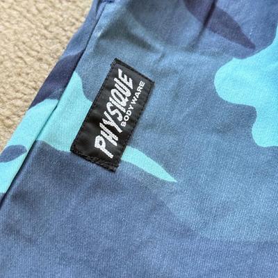 LOT 209L: Physique Body Wear Blue Camo Pants (M) w/ Jeans & Shorts: Old Navy The Diva Star Print (12), OP Lace Up (5), Snake Print...