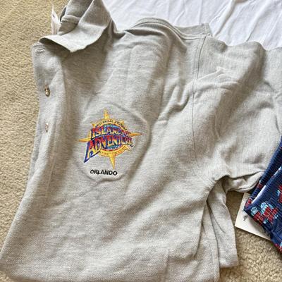 LOT 210A: 2000s Planet Hollywood Horror Series NWT T-Shirts (XL), Embroidered Universal Studios Islands of Adventure Orlando Polo NWT (L)...