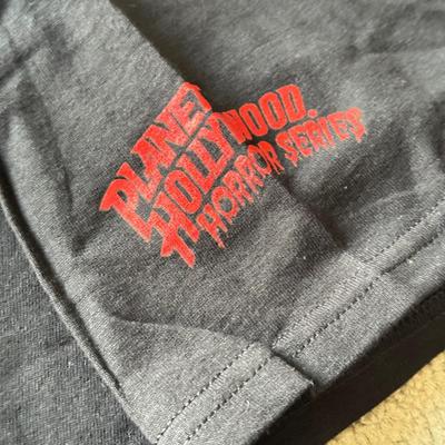 LOT 210A: 2000s Planet Hollywood Horror Series NWT T-Shirts (XL), Embroidered Universal Studios Islands of Adventure Orlando Polo NWT (L)...