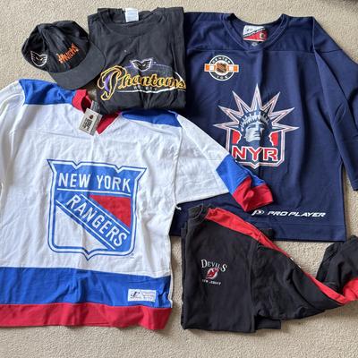 LOT 215A: Hockey Clothing: NHL NJ Devils Long Sleeve, Center Ice New York Rangers Pro Player Shirt (M), Logo Athletic NY Rangers Color...