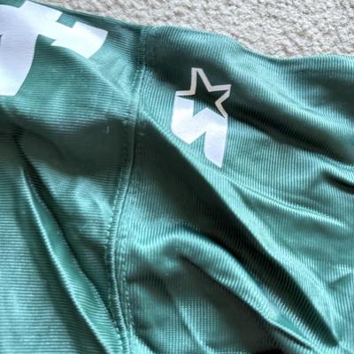 LOT 216A: NFL Team Merch: Green Bay Packers (Shirts, Jersey, Sweatpants), Miami Dolphins (Bedazzled Tee, Dan Marino Starter T, Jersey),...