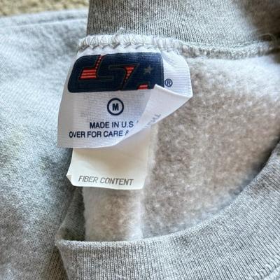 LOT 216A: NFL Team Merch: Green Bay Packers (Shirts, Jersey, Sweatpants), Miami Dolphins (Bedazzled Tee, Dan Marino Starter T, Jersey),...