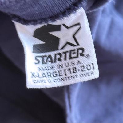 LOT 216A: NFL Team Merch: Green Bay Packers (Shirts, Jersey, Sweatpants), Miami Dolphins (Bedazzled Tee, Dan Marino Starter T, Jersey),...