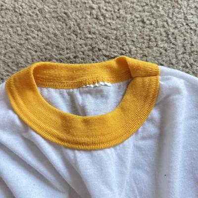 LOT 216A: NFL Team Merch: Green Bay Packers (Shirts, Jersey, Sweatpants), Miami Dolphins (Bedazzled Tee, Dan Marino Starter T, Jersey),...