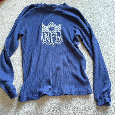 LOT 216A: NFL Team Merch: Green Bay Packers (Shirts, Jersey, Sweatpants), Miami Dolphins (Bedazzled Tee, Dan Marino Starter T, Jersey),...