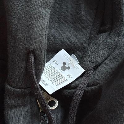 LOT 216A: NFL Team Merch: Green Bay Packers (Shirts, Jersey, Sweatpants), Miami Dolphins (Bedazzled Tee, Dan Marino Starter T, Jersey),...