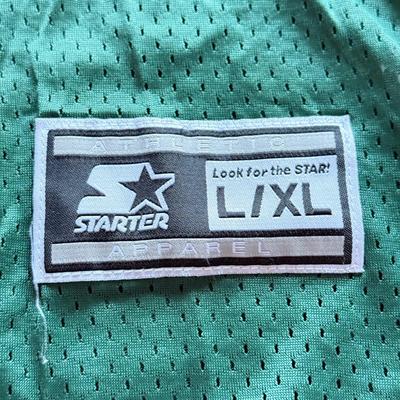 LOT 216A: NFL Team Merch: Green Bay Packers (Shirts, Jersey, Sweatpants), Miami Dolphins (Bedazzled Tee, Dan Marino Starter T, Jersey),...