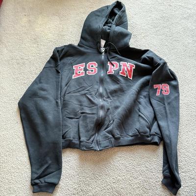 LOT 216A: NFL Team Merch: Green Bay Packers (Shirts, Jersey, Sweatpants), Miami Dolphins (Bedazzled Tee, Dan Marino Starter T, Jersey),...