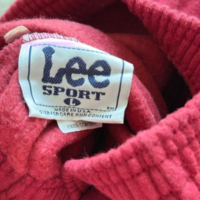 LOT 216A: NFL Team Merch: Green Bay Packers (Shirts, Jersey, Sweatpants), Miami Dolphins (Bedazzled Tee, Dan Marino Starter T, Jersey),...