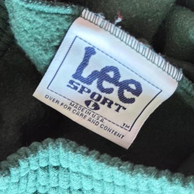 LOT 216A: NFL Team Merch: Green Bay Packers (Shirts, Jersey, Sweatpants), Miami Dolphins (Bedazzled Tee, Dan Marino Starter T, Jersey),...