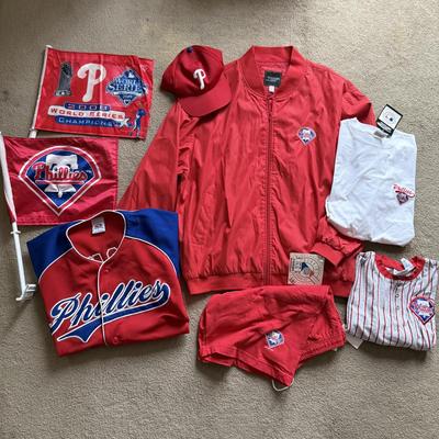 LOT 224L: MLB Philadelphia Phillies Fandom Collection: NWT Windbreaker (XL), #25 Jim Thome True Fan Jersey (L), T-Shirts, Hat & Car...