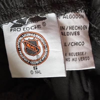 LOT 228L: NHL Philadelphia Flyers Clothing: PJ Pants, Sweat Suit, Polo, Muscle Tees, NWT & More