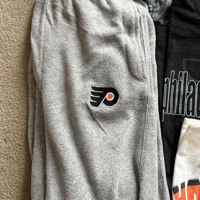 LOT 228L: NHL Philadelphia Flyers Clothing: PJ Pants, Sweat Suit, Polo, Muscle Tees, NWT & More