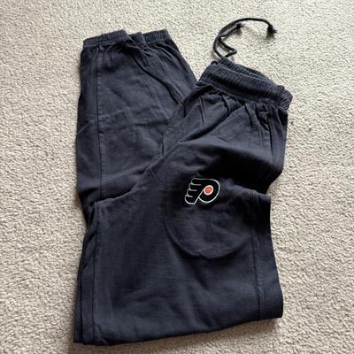 LOT 228L: NHL Philadelphia Flyers Clothing: PJ Pants, Sweat Suit, Polo, Muscle Tees, NWT & More