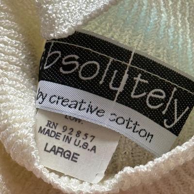 LOT 229L: Collection of NWT Juniors / Petite Women's Sweaters incl. Calvin Klein