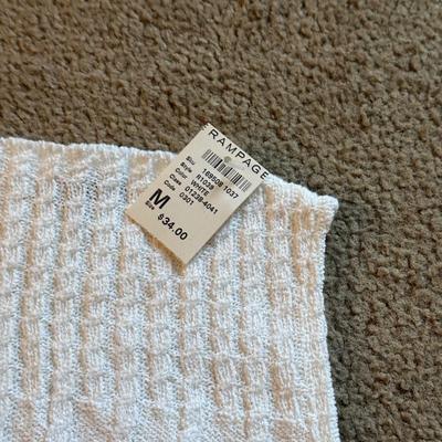 LOT 229L: Collection of NWT Juniors / Petite Women's Sweaters incl. Calvin Klein