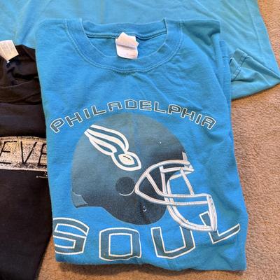 LOT 263B: Philadelphia Soul Football Fandom Collection: Shirts, Banner, Teddy & 2000s Cheerleader Signed Program