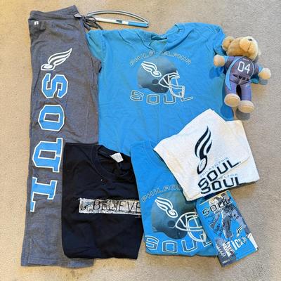 LOT 263B: Philadelphia Soul Football Fandom Collection: Shirts, Banner, Teddy & 2000s Cheerleader Signed Program