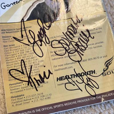 LOT 263B: Philadelphia Soul Football Fandom Collection: Shirts, Banner, Teddy & 2000s Cheerleader Signed Program