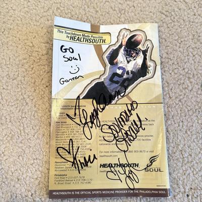 LOT 263B: Philadelphia Soul Football Fandom Collection: Shirts, Banner, Teddy & 2000s Cheerleader Signed Program