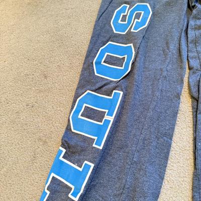 LOT 263B: Philadelphia Soul Football Fandom Collection: Shirts, Banner, Teddy & 2000s Cheerleader Signed Program