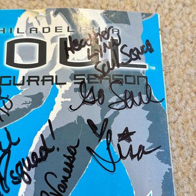 LOT 263B: Philadelphia Soul Football Fandom Collection: Shirts, Banner, Teddy & 2000s Cheerleader Signed Program