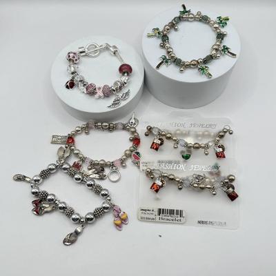 LOT 281J: Collection of Charm Bracelets