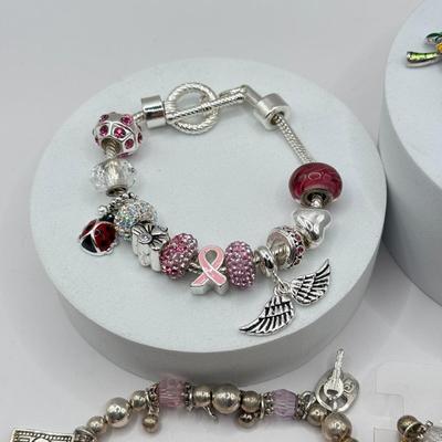 LOT 281J: Collection of Charm Bracelets