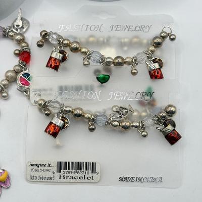 LOT 281J: Collection of Charm Bracelets
