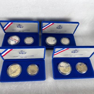 Coins: 1986 Liberty Coins, Proof Silver Dollar and Clad Half-Dollar (4 sets)