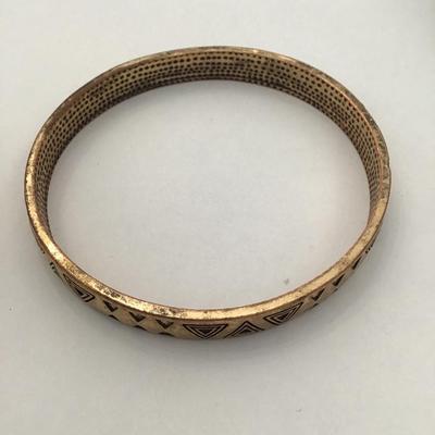 Super cool, gold toned triangle bangle bracelet