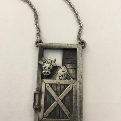 Unique, pewter cow & farmer necklace