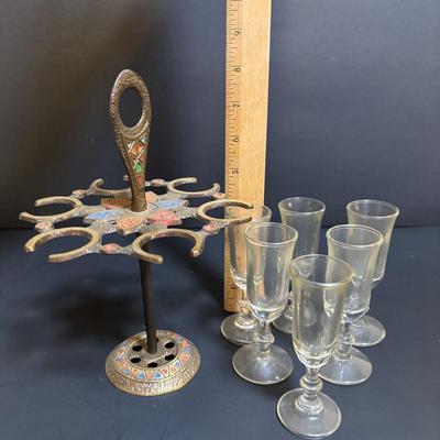 LOT 204: Brass Kiddush Cup Holder & Glass Set made in Isreal, Set of 6 Footed Glasses along with Blue Stem, Swirl Optic Glassware