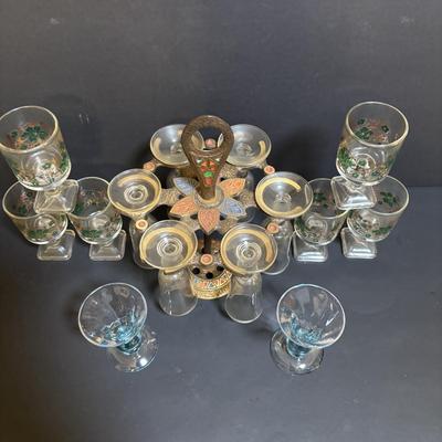 LOT 204: Brass Kiddush Cup Holder & Glass Set made in Isreal, Set of 6 Footed Glasses along with Blue Stem, Swirl Optic Glassware