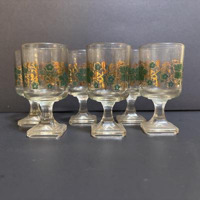 LOT 204: Brass Kiddush Cup Holder & Glass Set made in Isreal, Set of 6 Footed Glasses along with Blue Stem, Swirl Optic Glassware