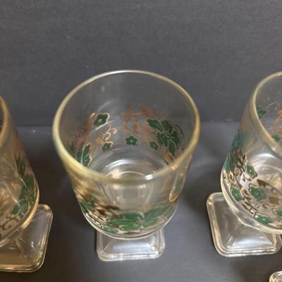 LOT 204: Brass Kiddush Cup Holder & Glass Set made in Isreal, Set of 6 Footed Glasses along with Blue Stem, Swirl Optic Glassware