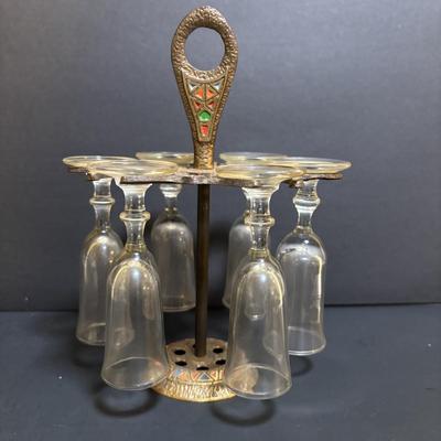 LOT 204: Brass Kiddush Cup Holder & Glass Set made in Isreal, Set of 6 Footed Glasses along with Blue Stem, Swirl Optic Glassware