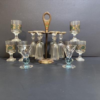 LOT 204: Brass Kiddush Cup Holder & Glass Set made in Isreal, Set of 6 Footed Glasses along with Blue Stem, Swirl Optic Glassware