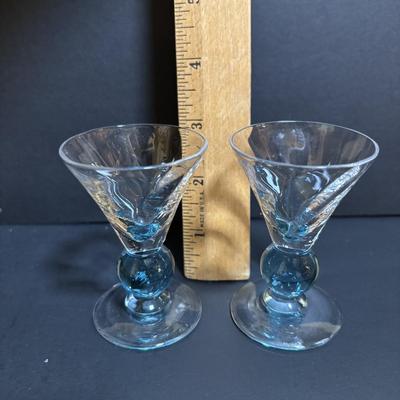 LOT 204: Brass Kiddush Cup Holder & Glass Set made in Isreal, Set of 6 Footed Glasses along with Blue Stem, Swirl Optic Glassware