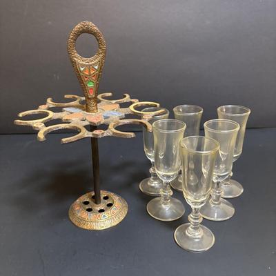 LOT 204: Brass Kiddush Cup Holder & Glass Set made in Isreal, Set of 6 Footed Glasses along with Blue Stem, Swirl Optic Glassware