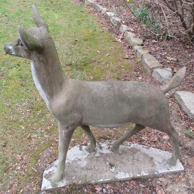 Solid Concrete Heavy Yard Doe UPDATE: Two people were able to move the buck to the back yard