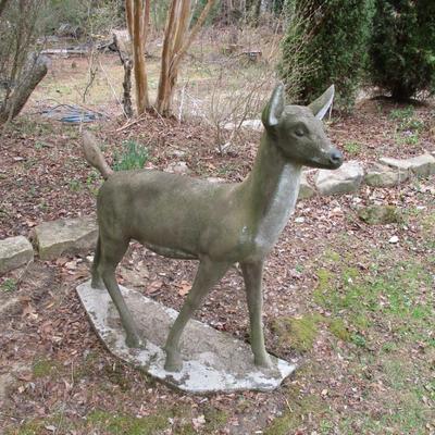 Solid Concrete Heavy Yard Doe UPDATE: Two people were able to move the buck to the back yard