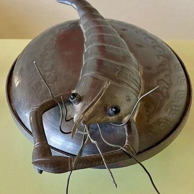 Covered Metal Bowl With Lobster On Top