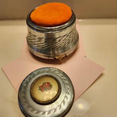 Silvertone Powder Puff Music Box with etched leaf design