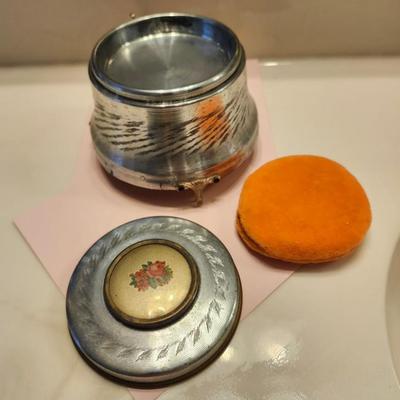 Silvertone Powder Puff Music Box with etched leaf design